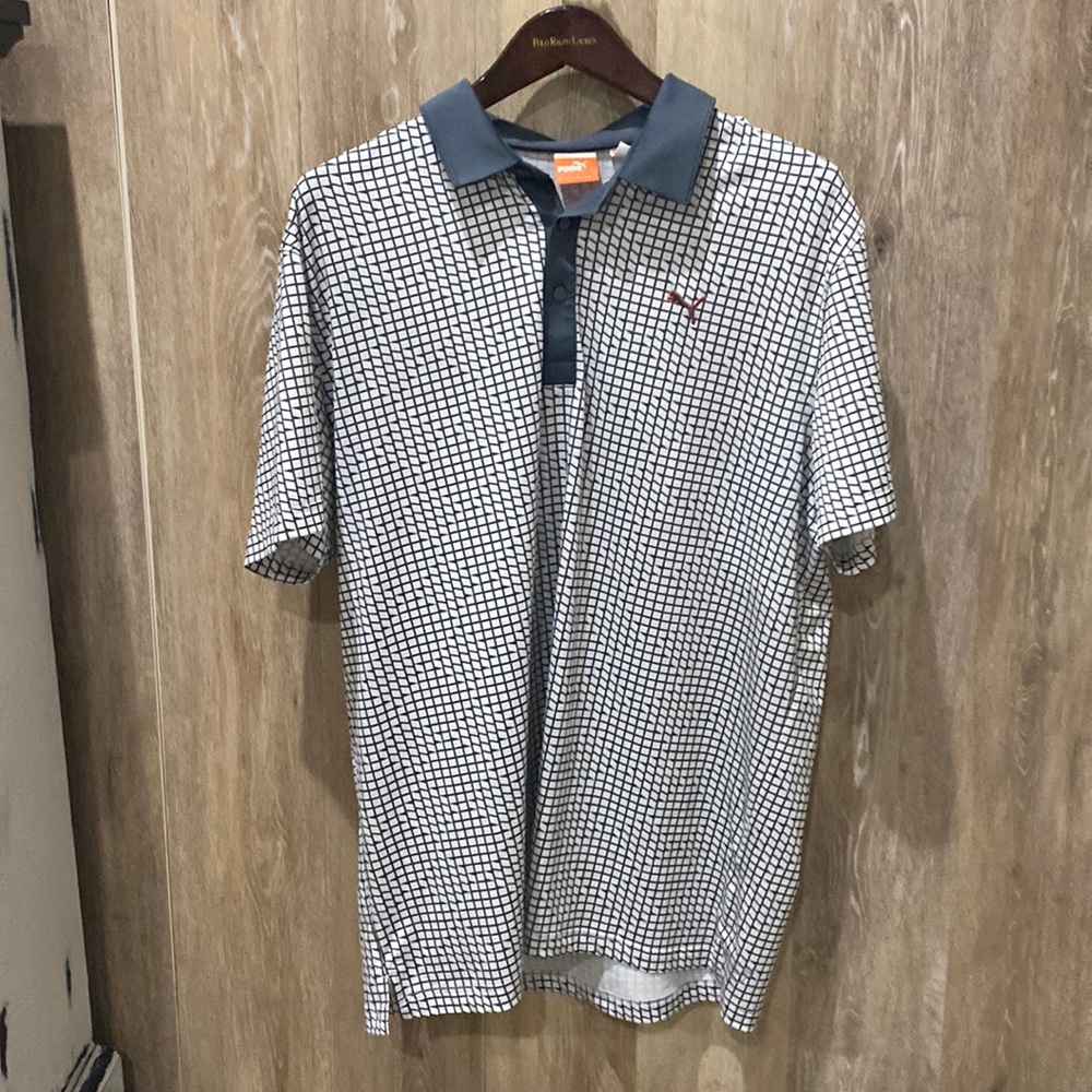 Puma golf shirt. White and gray checker/tire tread pattern.